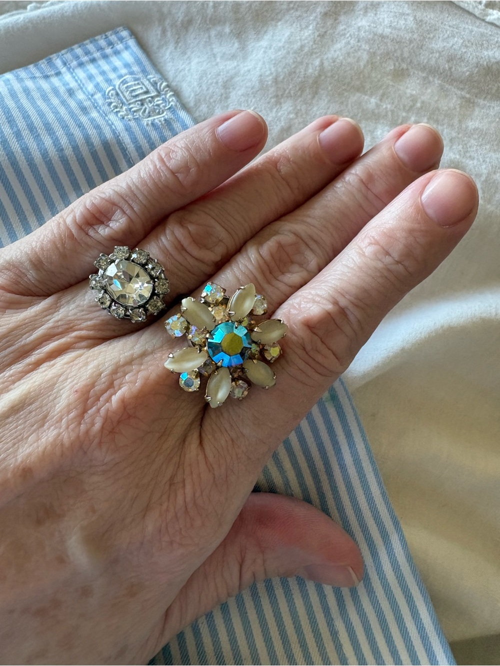 Set of two rings made from vintage clip earrings. Size adjustable.